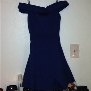 Dark blue off the shoulder dress.